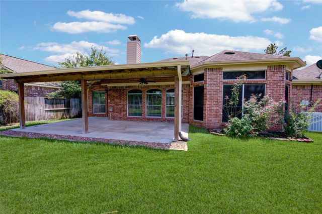 9026 Robinhoods Well Drive, Spring, TX 77379