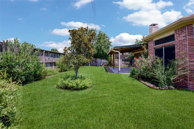 9026 Robinhoods Well Drive, Spring, TX 77379