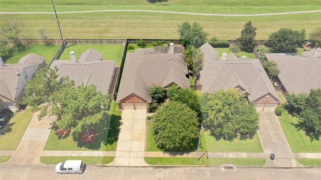 9026 Robinhoods Well Drive, Spring, TX 77379