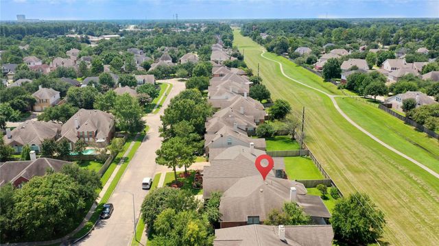 9026 Robinhoods Well Drive, Spring, TX 77379