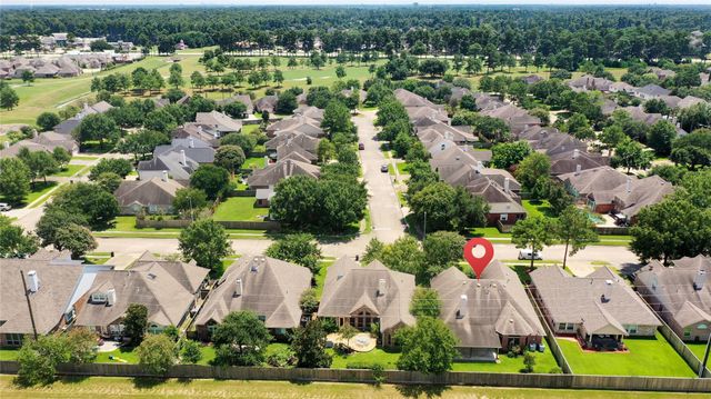 9026 Robinhoods Well Drive, Spring, TX 77379