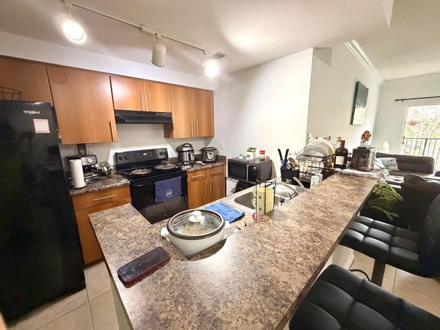 6020 W Sample Road 303, Coral Springs, FL 33067
