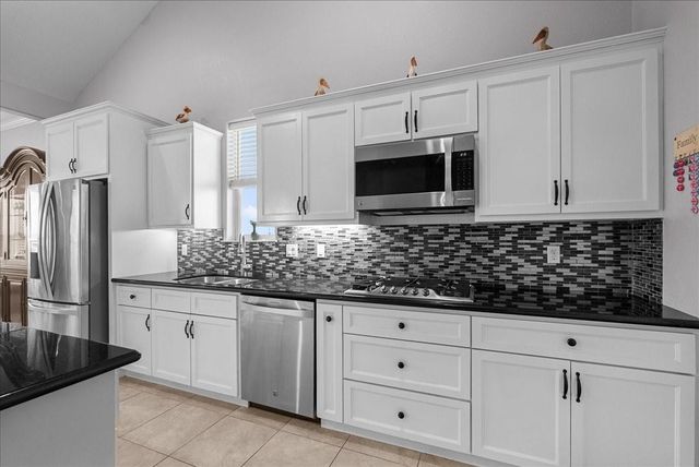 7014 Terrasso Drive, Hitchcock, TX 77563