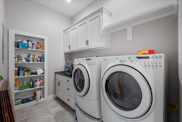 7014 Terrasso Drive, Hitchcock, TX 77563