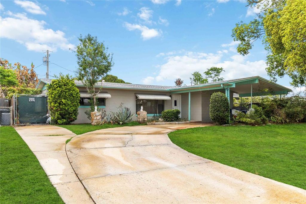 Image 1 of property listing at 6210 SPANISH OAK DRIVE, Orlando, FL 32809