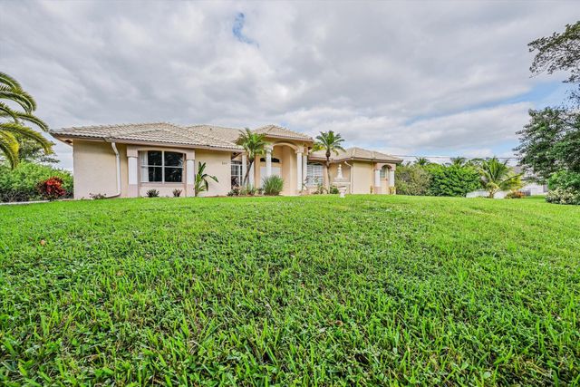 8671 155th Place N, Palm Beach Gardens, FL 33418