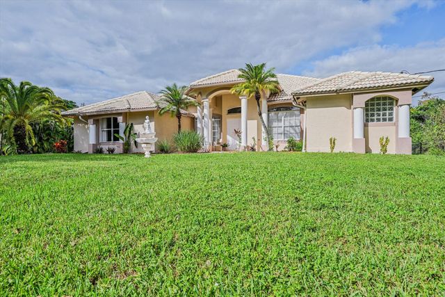 8671 155th Place N, Palm Beach Gardens, FL 33418