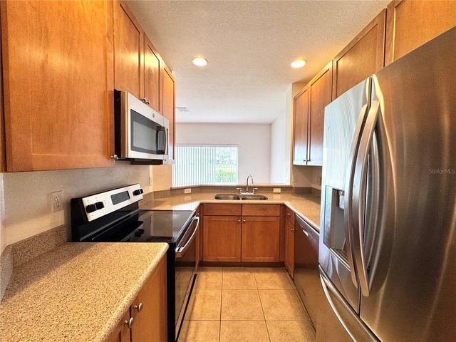 10735 SAVANNAH WOOD DRIVE 208, Orlando, FL 32832