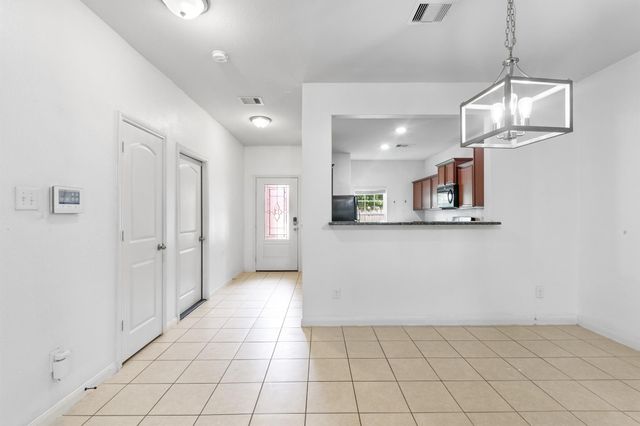 7675 Dragon Pearls Lane, Conroe, TX 77304