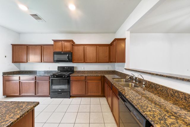 7675 Dragon Pearls Lane, Conroe, TX 77304