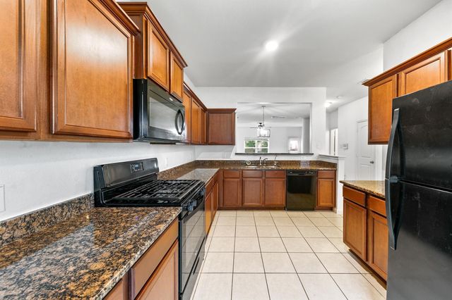 7675 Dragon Pearls Lane, Conroe, TX 77304