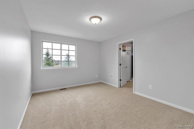 1002 Carriage Trace Boulevard, South Lyon, MI 48178