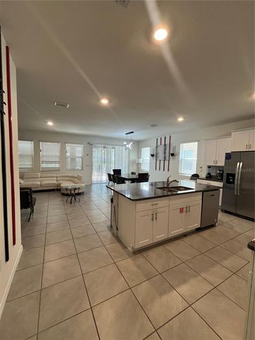 5117 OAKBOURNE AVENUE, Davenport, FL 33837