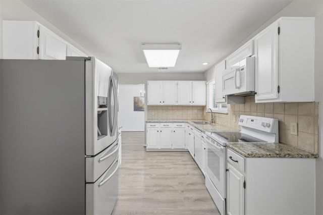 3326 Creek Shadows Drive, Houston, TX 77339
