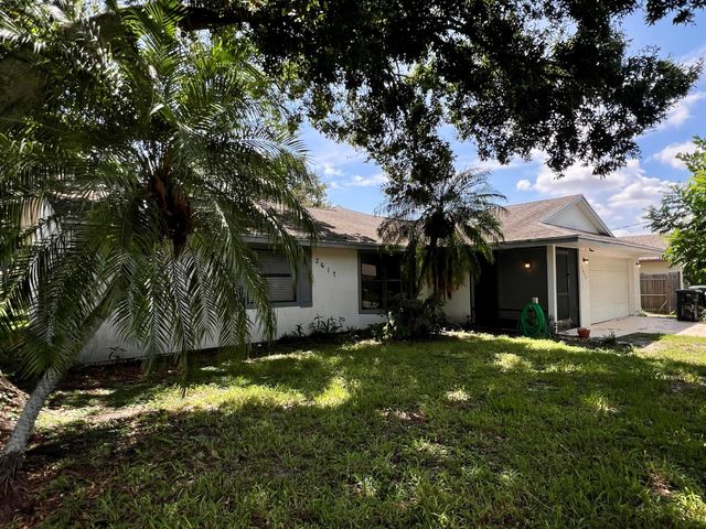 2617 SW Chestnut Lane, Port St Lucie, FL 34953