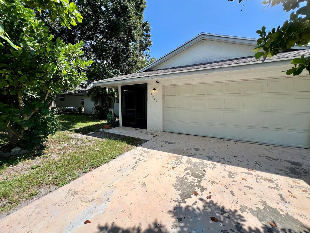 2617 SW Chestnut Lane, Port St Lucie, FL 34953
