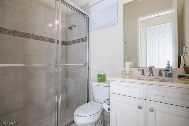 3296 Pacific DR, Naples, FL 34119