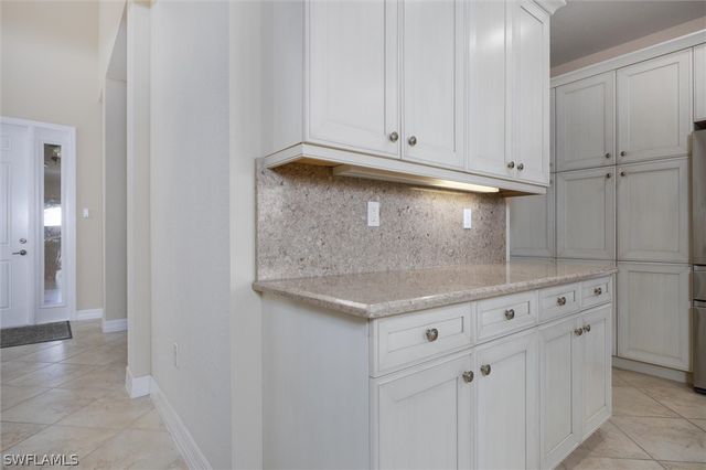 3296 Pacific DR, Naples, FL 34119