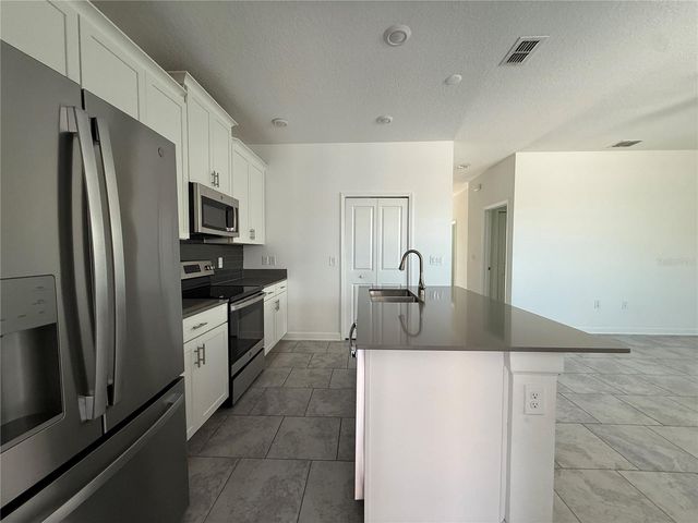 5647 QUIET PALM LOOP, St Cloud, FL 34771
