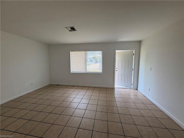 711 Gordon AVE S, Lehigh Acres, FL 33973