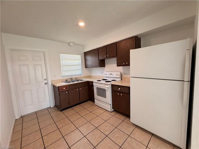 711 Gordon AVE S, Lehigh Acres, FL 33973