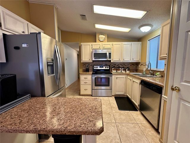 1704 LILLY LANE, The Villages, FL 32159