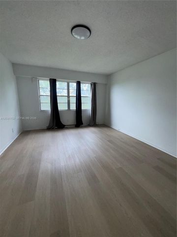 12950 SW 7th Court 404A, Pembroke Pines, FL 33027