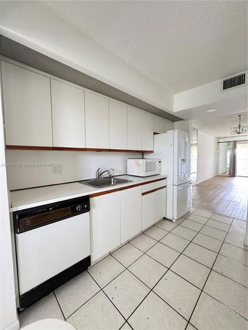 12950 SW 7th Court 404A, Pembroke Pines, FL 33027