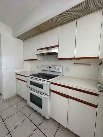 12950 SW 7th Court 404A, Pembroke Pines, FL 33027