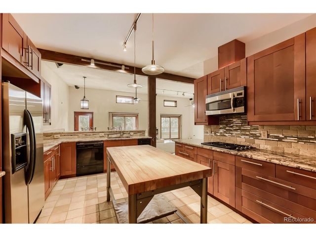 720 N Bluff Dr, Franktown, CO 80116