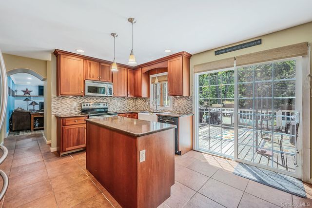 28 Artist Lake Boulevard, Middle Island, NY 11953