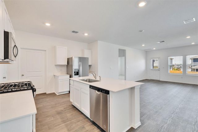 12305 Bulldogger BND, Mustang Ridge, TX 78610