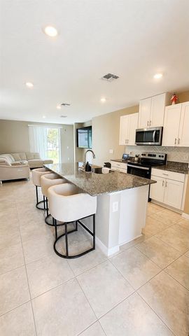 5514 CLOVE ROW, Haines City, FL 33844
