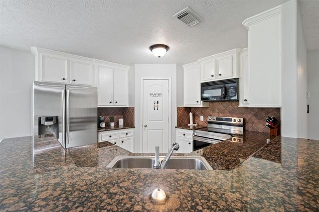 402 Eastwood Drive, Woodbranch, TX 77357