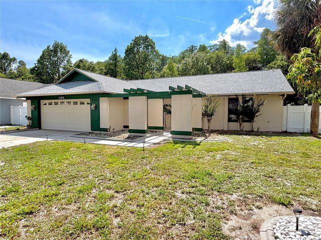 15306 WINTERWIND DRIVE, Tampa, FL 33624