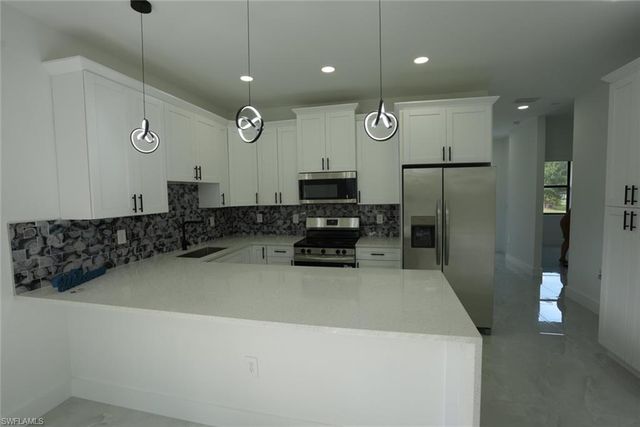 379 Selkirk AVE, Lehigh Acres, FL 33974