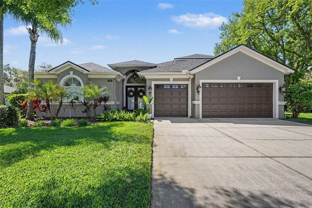 1310 OXBRIDGE DRIVE, Lutz, FL 33549