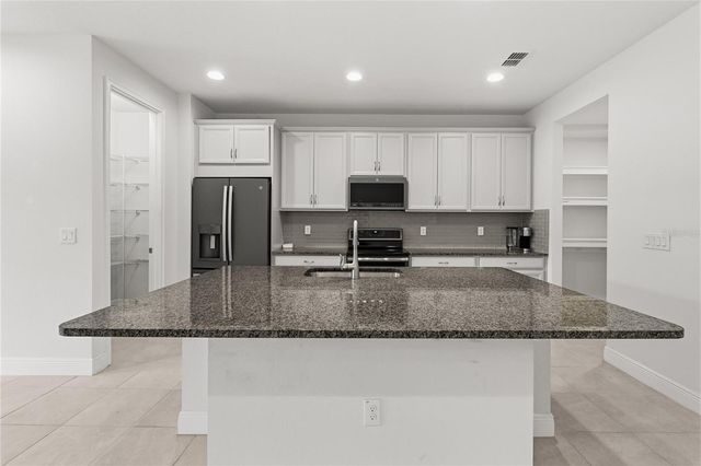 2313 SUNSET WIND LOOP, Oldsmar, FL 34677