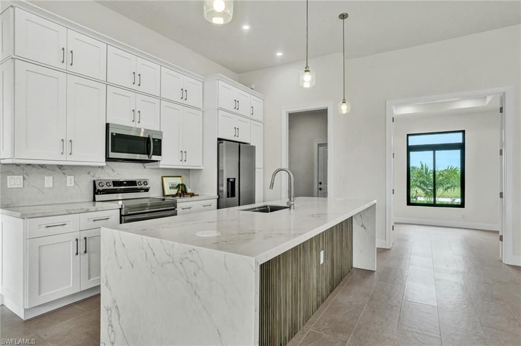 Image 11 of property listing at 1239 NW 24th TER, Cape Coral, FL 33993
