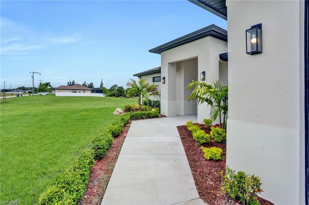 Image 2 of property listing at 1239 NW 24th TER, Cape Coral, FL 33993