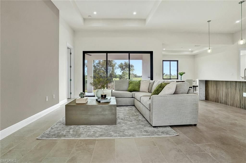 Image 3 of property listing at 1239 NW 24th TER, Cape Coral, FL 33993