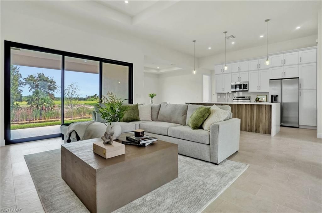 Image 4 of property listing at 1239 NW 24th TER, Cape Coral, FL 33993