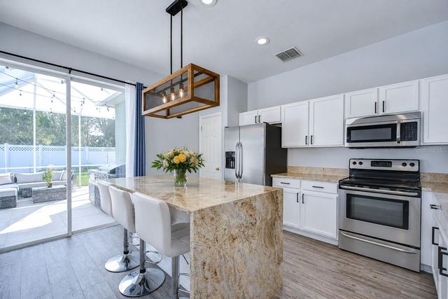 2320 SPRING HOLLOW LOOP, Wesley Chapel, FL 33544