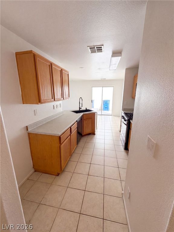 10040 Fragile Fields Street, Las Vegas, NV 89183 — photo 2