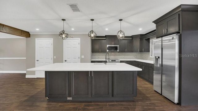 3433 GLOSSY LEAF LANE, Clermont, FL 34711