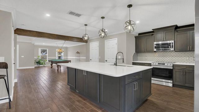 3433 GLOSSY LEAF LANE, Clermont, FL 34711