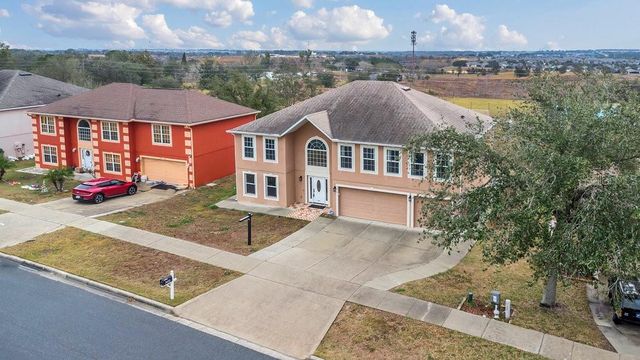 3433 GLOSSY LEAF LANE, Clermont, FL 34711