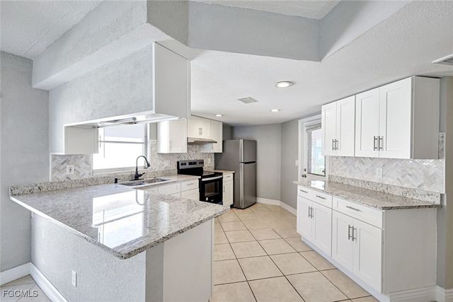 321 Dania ST, Lehigh Acres, FL 33936