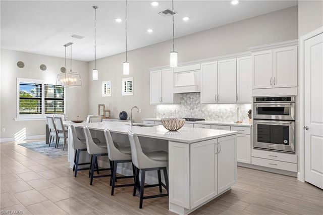 9124 Snowy Owl WAY, Naples, FL 34120