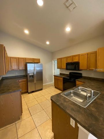 502 BLACKBIRD LANE A, Poinciana, FL 34759